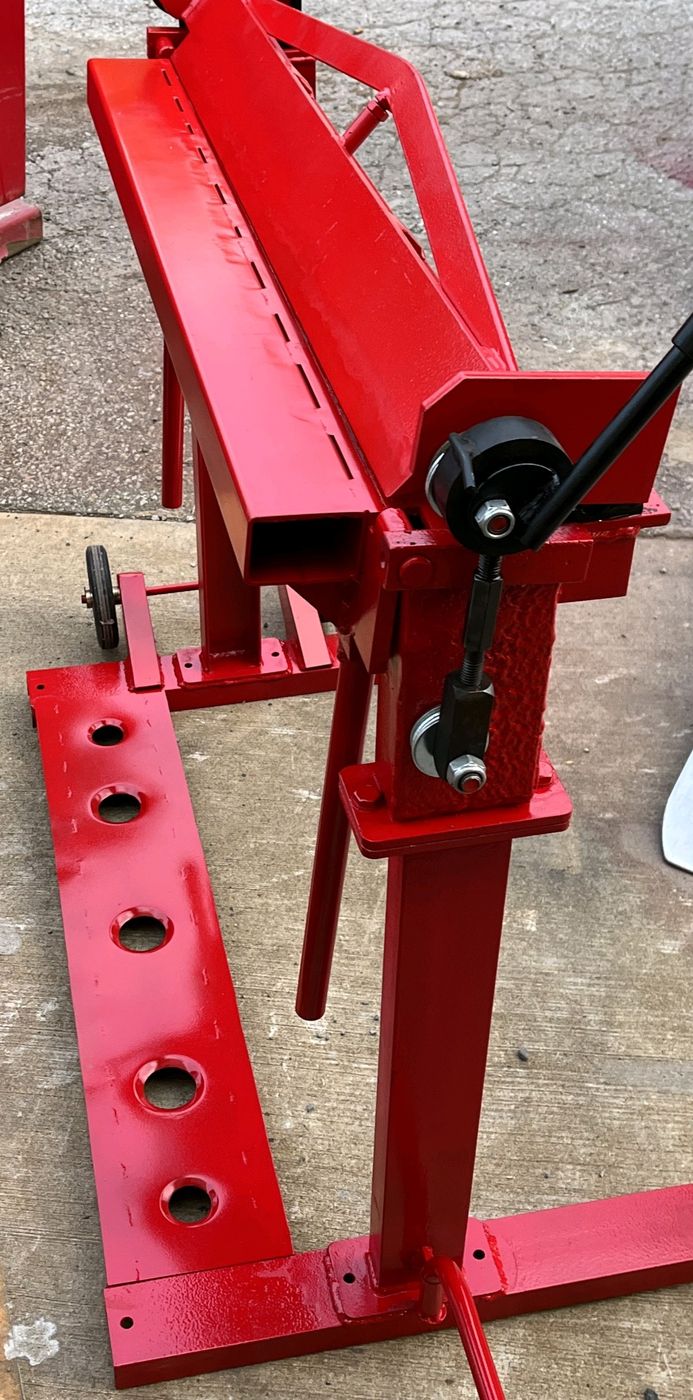 Sheet metal bender modified and refinished in red
