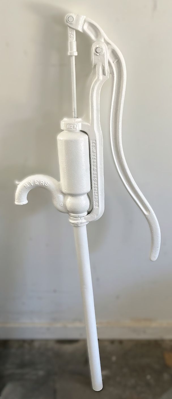 Vintage cast-iron Myers hand pump refinished in white