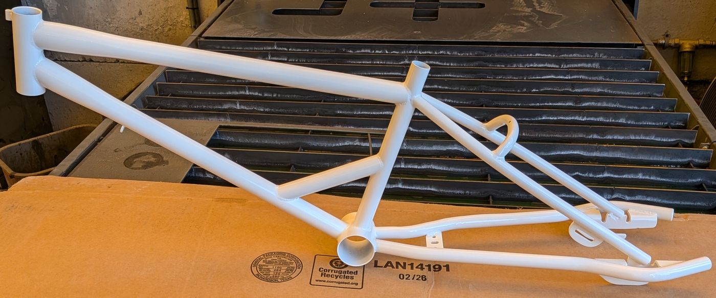 BMX bicycle frame refinished in gloss white powder coat